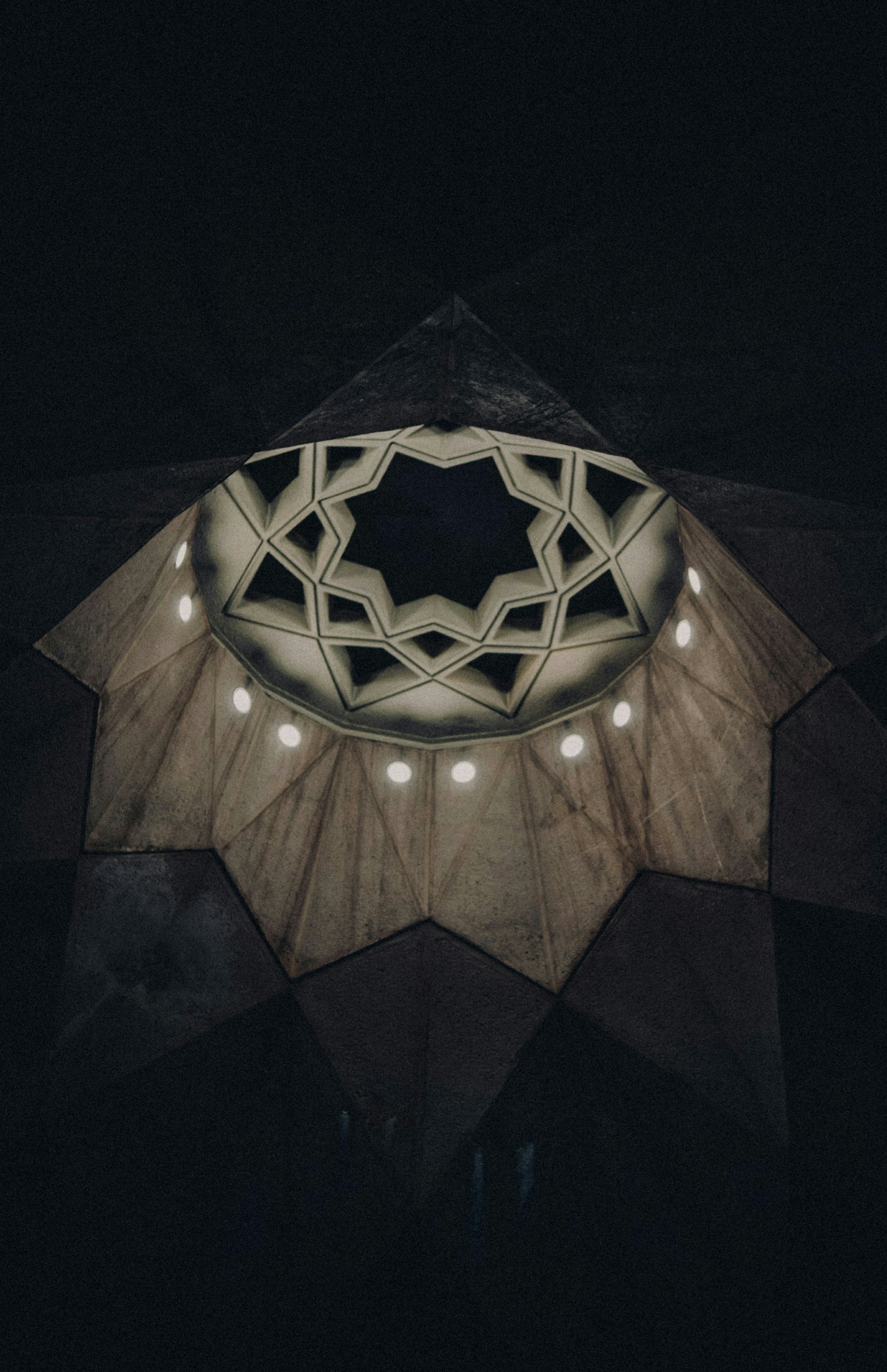 Intricate geometric dome ceiling with radial symmetry